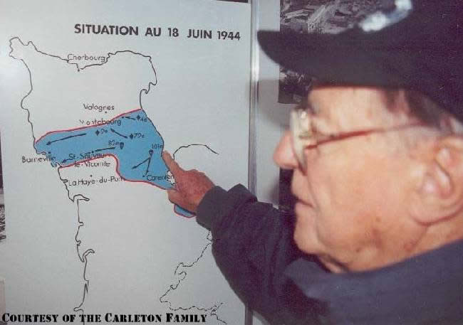 Robert 'Bob' Carleton shows where he landed during D-Day